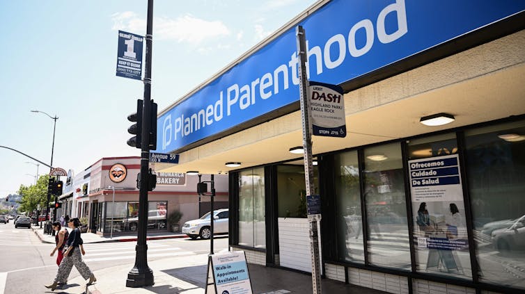 Planned Parenthood signage is displayed outside a health care clinic.